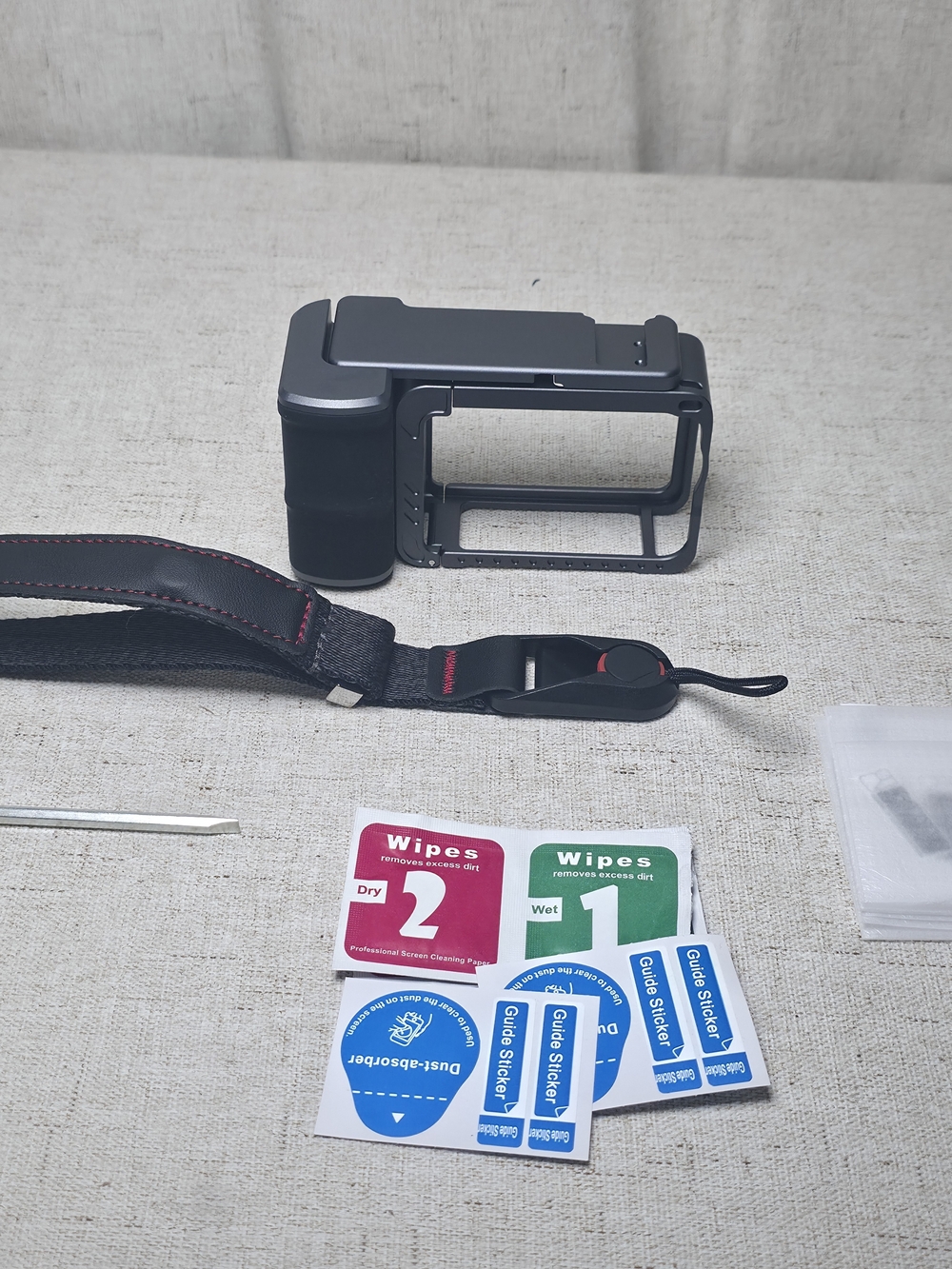 DJI Action 6 Aluminum Cage and handle for street photography.